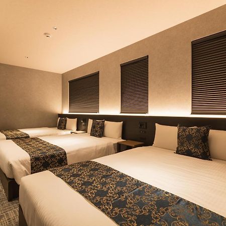 Aparthotel Grand Base Kagoshima Chuo Esterno foto