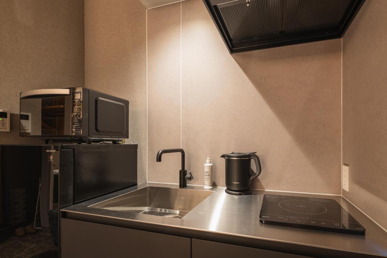 Aparthotel Grand Base Kagoshima Chuo Esterno foto