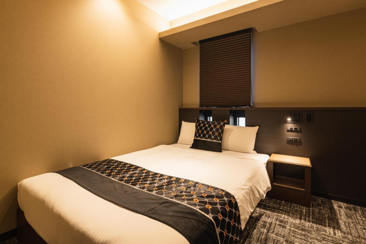 Aparthotel Grand Base Kagoshima Chuo Esterno foto