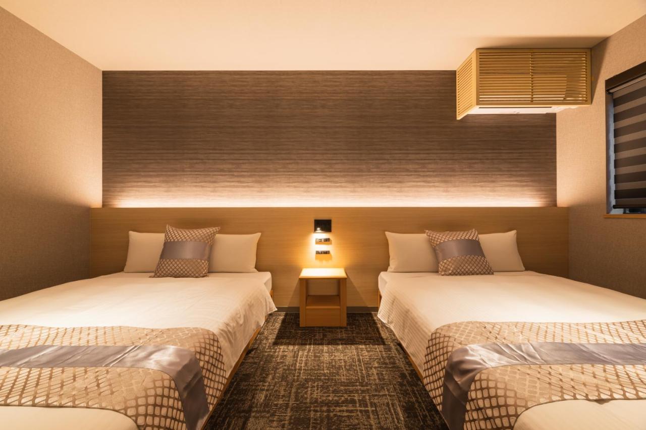 Aparthotel Grand Base Kagoshima Chuo Esterno foto