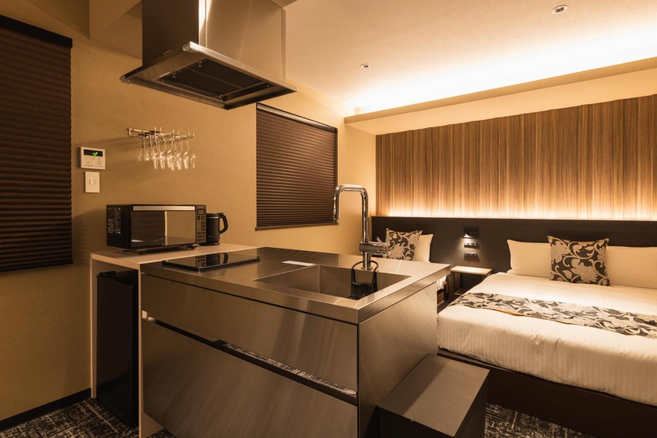 Aparthotel Grand Base Kagoshima Chuo Esterno foto