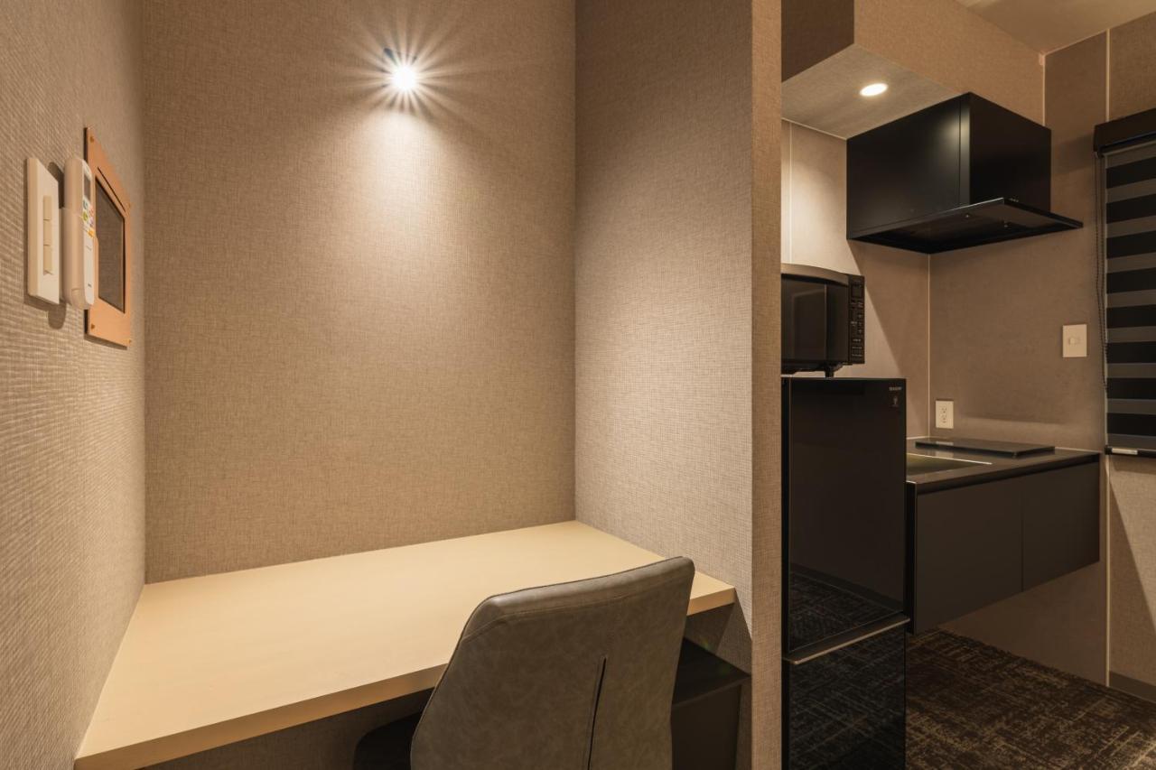 Aparthotel Grand Base Kagoshima Chuo Esterno foto