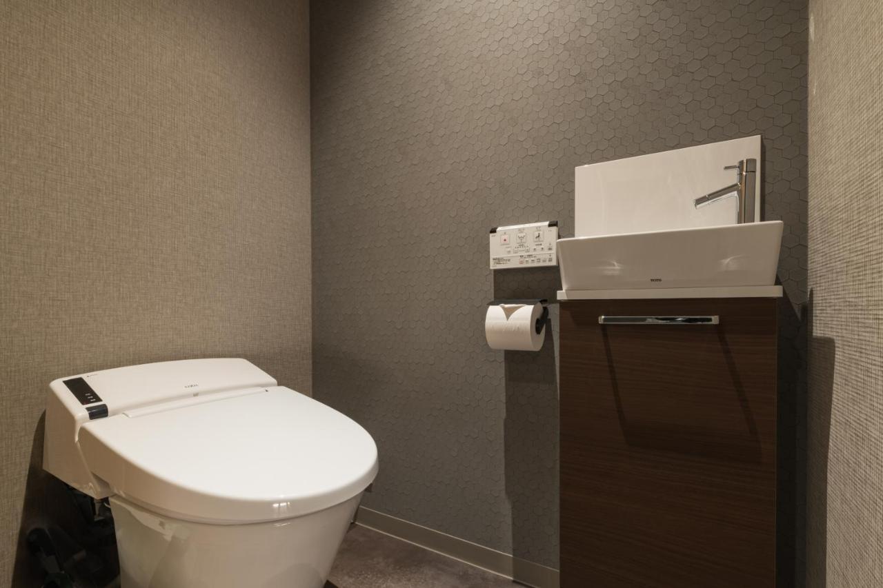 Aparthotel Grand Base Kagoshima Chuo Esterno foto