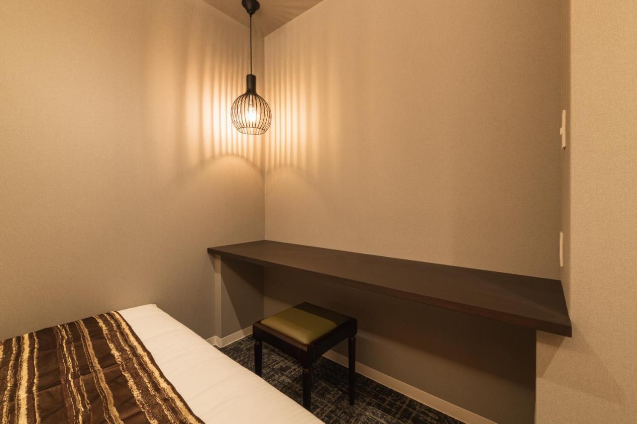 Aparthotel Grand Base Kagoshima Chuo Esterno foto