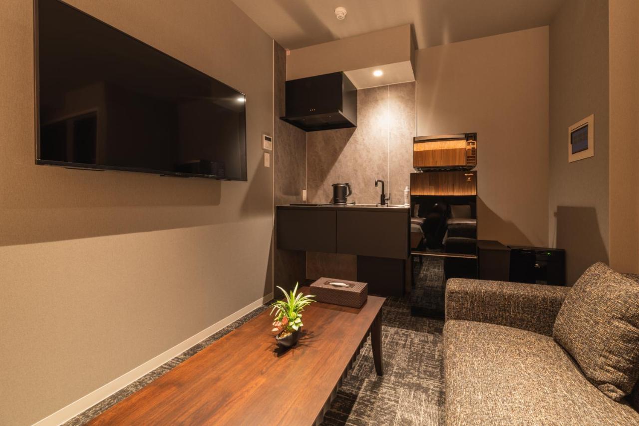 Aparthotel Grand Base Kagoshima Chuo Esterno foto